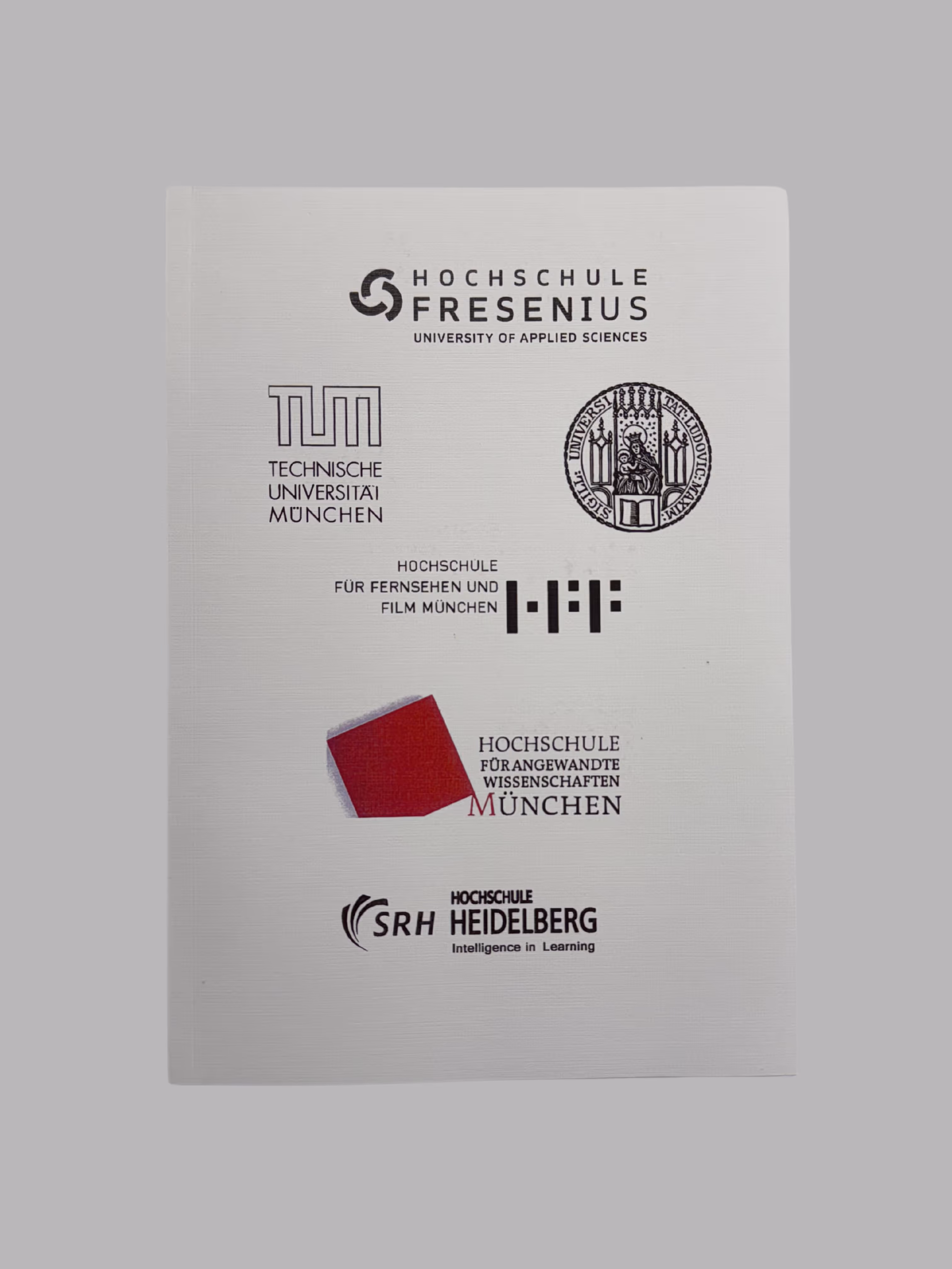 White cover with logos of German universities including Hochschule Fresenius University of Applied Sciences, Technische Universität München, Hochschule für Fernsehen und Film München, Hochschule für Angewandte Wissenschaften München, and SRH Hochschule Heidelberg.